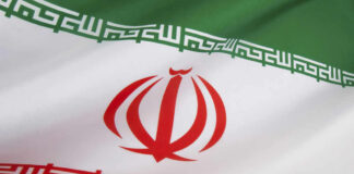 Iranian flag with green, white, red stripes.