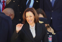 Woman smiling in formal attire at an event