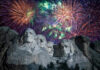 Fireworks exploding over Mount Rushmore at night