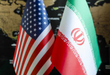 Flags of the United States and Iran displayed together