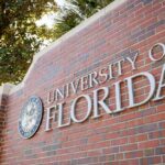Lawsuit ERUPTS: University Silences Conservative Group Sign for the University of Florida on a brick wall
