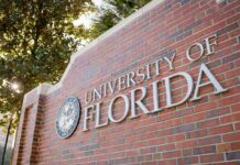 Sign for the University of Florida on a brick wall