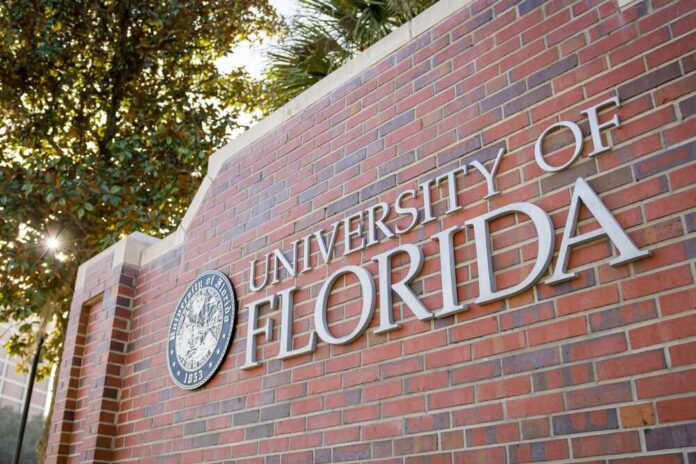 Sign for the University of Florida on a brick wall