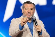 Outrage as Judges Shielded by Democrats, GOP Fights Back A man in a light suit speaking passionately into a microphone