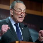 A politician delivering a passionate speech at a podium