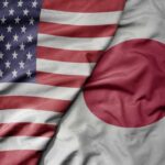 Trump’s Dinner Diplomacy Shocks Critics Flags of the United States and Japan overlapping