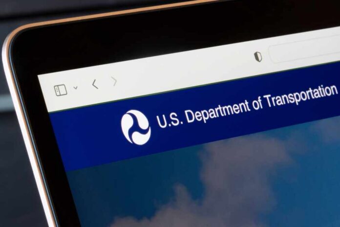 Close-up of a digital screen displaying the U.S. Department of Transportation website