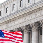 Supreme Court Trust SHATTERED—Worst Numbers Yet Facade of a United States courthouse with an American flag in the foreground