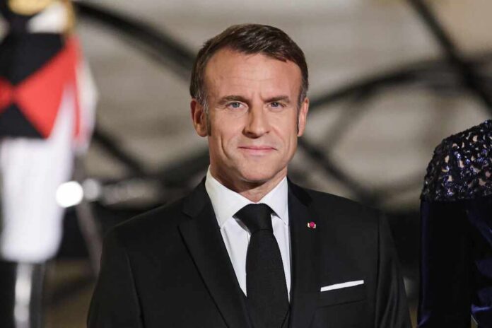 Emmanuel Macron in formal attire at a state event