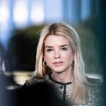 GOP Revolt: Subpoena Issued Against Trump’s AG A professional woman with long blonde hair and a serious expression, wearing business attire