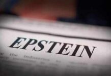 Close-up of a newspaper headline reading 'EPSTEIN'