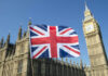 Union Jack flag in front of Big Ben and the Houses of Parliament