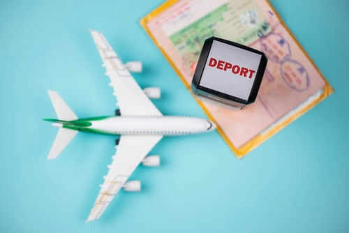 Toy airplane passport deport stamp blue background