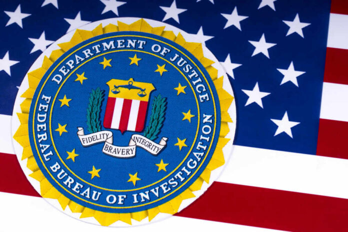 FBI seal on American flag background