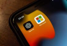 Close-up of smartphone screen displaying OpenAI and Microsoft app icons
