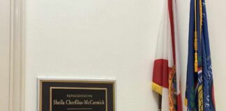 Plaque of Representative Sheila Cherfilus-McCormick in a government office