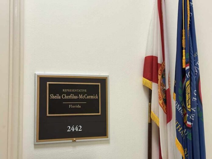 Plaque of Representative Sheila Cherfilus-McCormick in a government office