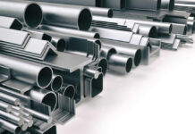 Various metal pipes and profiles stacked together