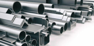 Various metal pipes and profiles stacked together