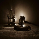 Shocking Turn: 60 Lawmakers Challenge Death Row Conviction Gavel and electric chair in dimly lit room