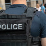 Police AI Sparks Legal CHAOS – Misidentifications Surge Police officer in uniform with badge on the arm