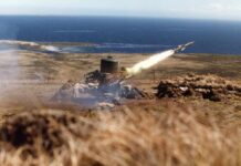 Surface-to-air missile launches from coastal battery