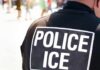 Outrageous Proposal: Jail ICE to Save California? Close-up of a police officer's back with a 'POLICE ICE' badge
