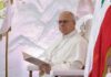 Pope’s STUNNING Admission—Did Vatican Legitimize Slavery? Pope seated in a ceremonial chair with flags in the background