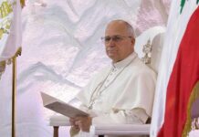 Pope’s STUNNING Admission—Did Vatican Legitimize Slavery? Pope seated in a ceremonial chair with flags in the background