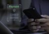 User entering payment information on a smartphone