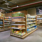 Supermarket aisle with various organic food products displayed