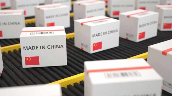 Shipping boxes labeled made in China on a conveyor belt