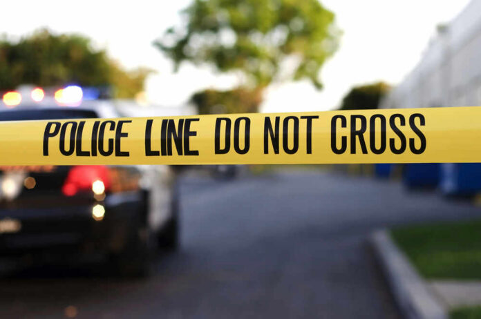 crime-scene-24948199 Yellow police tape with text police line do not cross