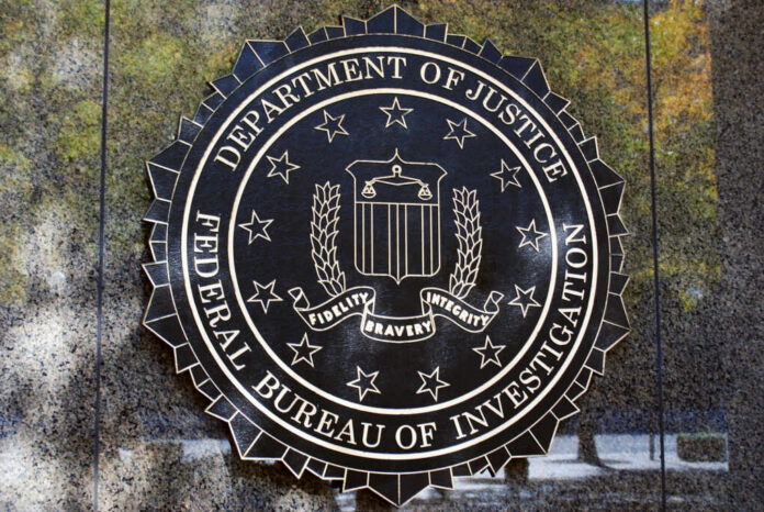 fbi-sign-on-the-building1733876597jpg FBI seal on a concrete wall outdoors