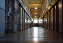 Case-By-Case Chaos Endangers Women Empty prison corridor with metal cell doors visible