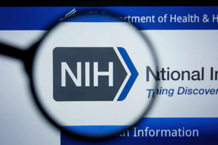 nih-website-homepage1454623682jpg magnifying glass over NIH logo on a website