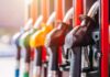 Colorful fuel nozzles at a gas station