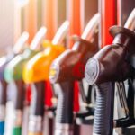 Trump Demands Gas Investigation Colorful fuel nozzles at a gas station