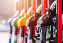 Colorful fuel nozzles at a gas station