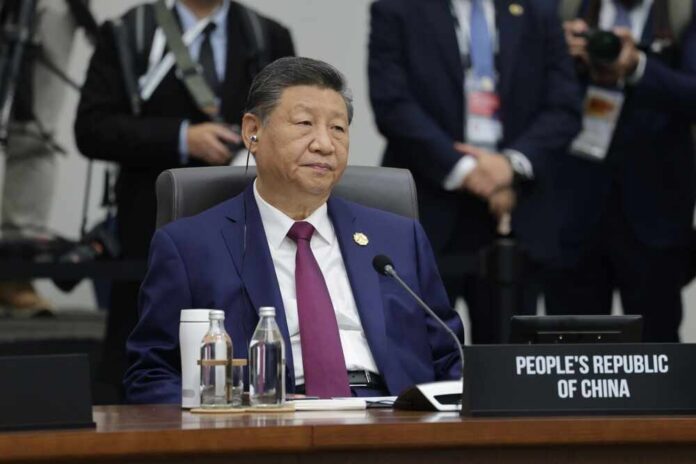 Gyeongju,,Korea,-,October,1,2025:,President,Of,The,People's Senior official in a blue suit sits at an international conference table