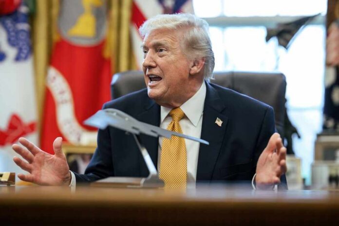 President,Donald,J.,Trump,Signs,An,Executive,Order,Creating,An Donald Trump speaking animatedly in the Oval Office