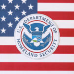 DHS Smear Explodes — Evidence Nowhere U.S. Department of Homeland Security seal on American flag
