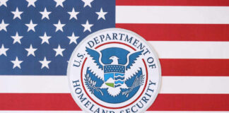 U.S. Department of Homeland Security seal on American flag