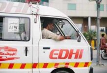 Unsafe School Claims Fourteen Young Lives Ambulance driver in a white EDHI van