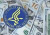 Billions Frozen, Families Left Waiting HHS seal on a pile of US dollar bills