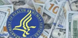 HHS seal on a pile of US dollar bills