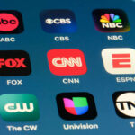 Smartphone screen showing TV network app icons