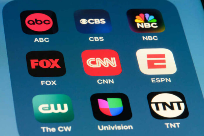 Smartphone screen showing TV network app icons