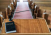 Another Blow Against The Church Bible and microphone on a church pulpit