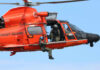 Flood Heroes Save Hundreds Across Texas Rescue helicopter with crew performing hoist operation